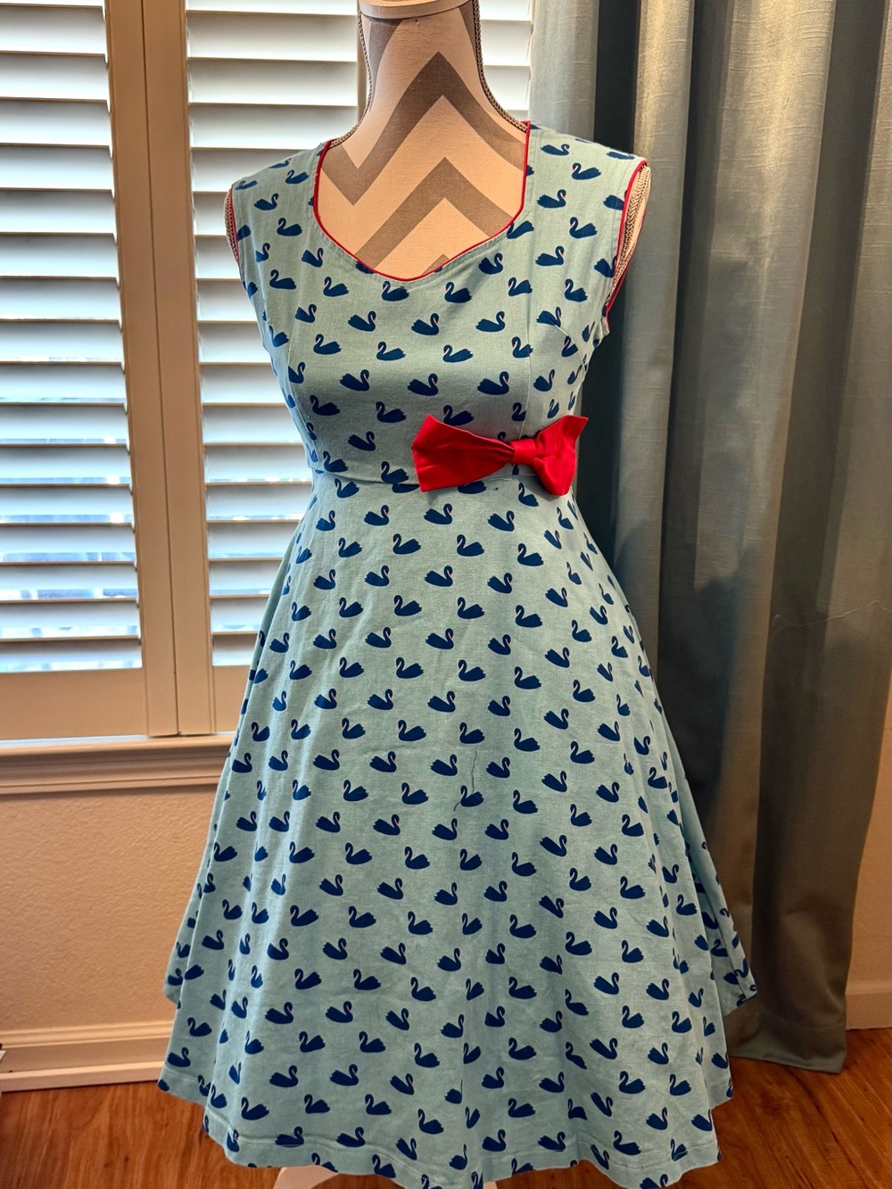 Lindy Bop Light Blue Swan Print Dress with Red Bow